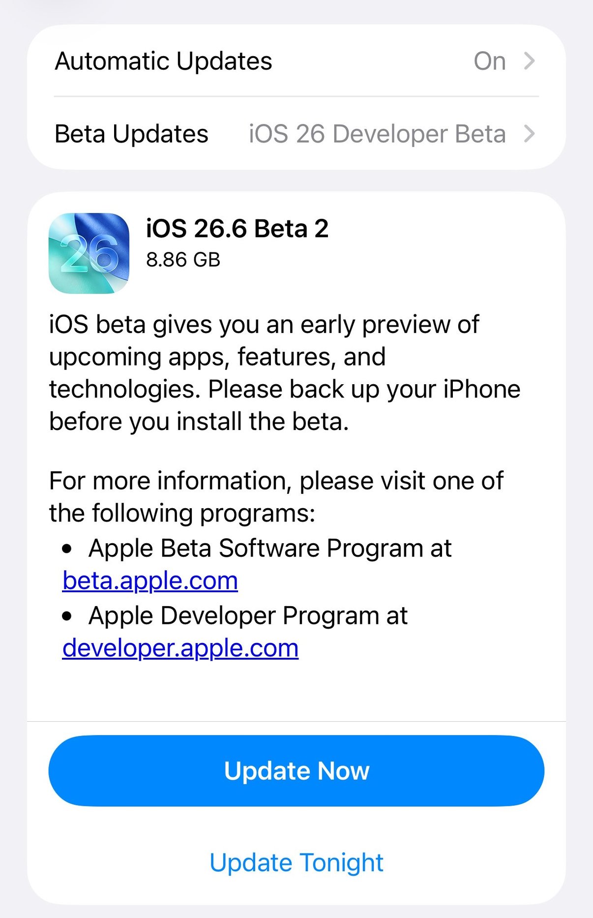 The iPhone Software Update screen showing iOS 26.6 Beta 2 at 8.86 GB, on the iOS 26 Developer Beta channel, with Update Now and Update Tonight buttons.