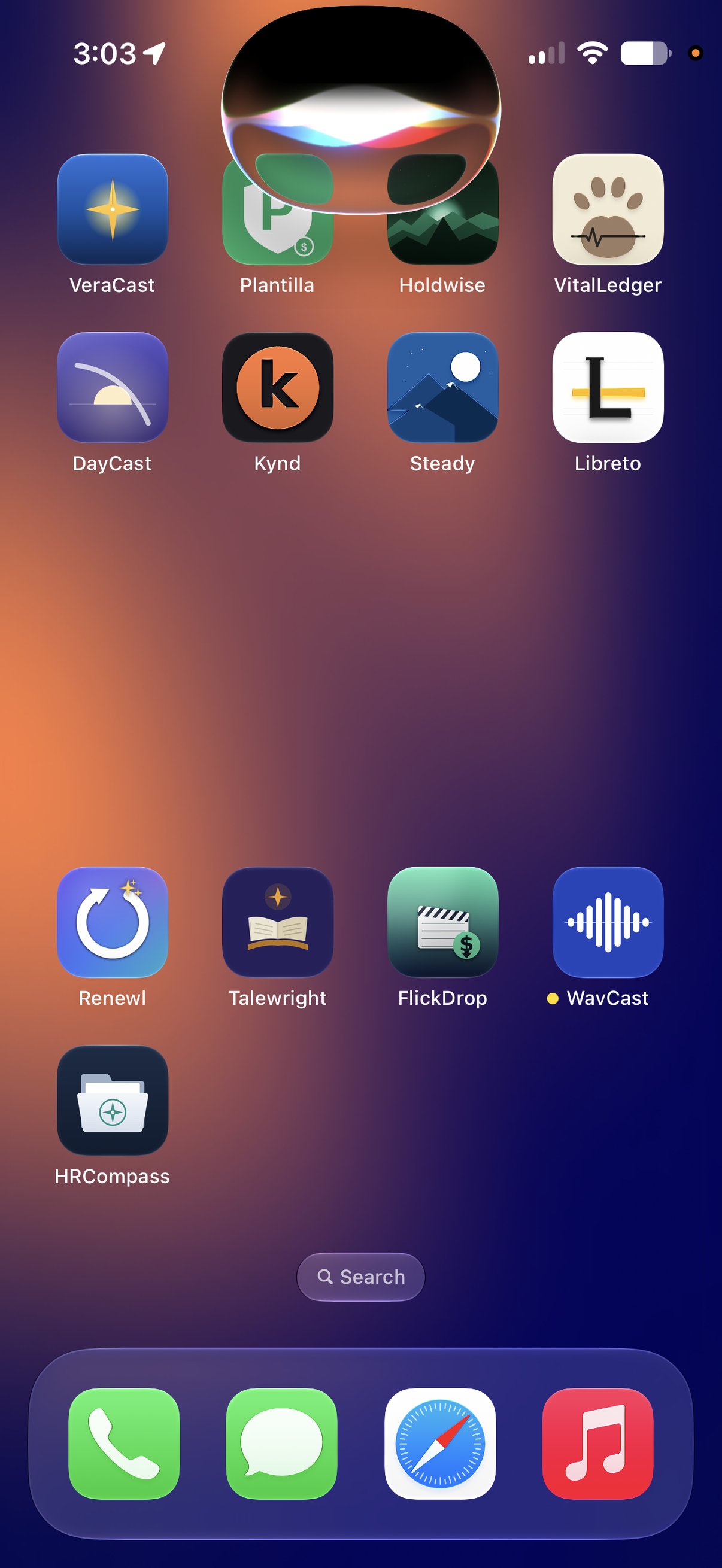 The new Siri active on the iPhone home screen in the iOS 27 beta, shown as a glowing orb in the Dynamic Island.